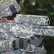 Illustration for article titled XM25 Carbine Kills Bad Guys Behind Walls, Beyond Hills, Below Trenches